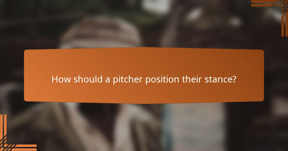 How should a pitcher position their stance?